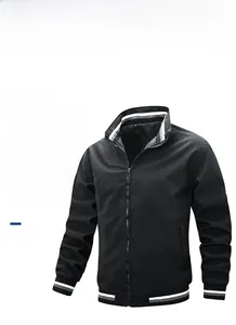 Detail of black bomber jacket with striped ribbed collar and silver metal zipper closure