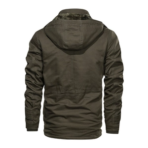 Detail view of military green hooded jacket featuring reinforced stitching and elastic cuffs