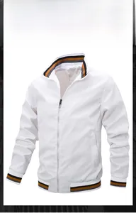 Detailed view of white baseball jacket with striped knit ribbing on collar and cuffs