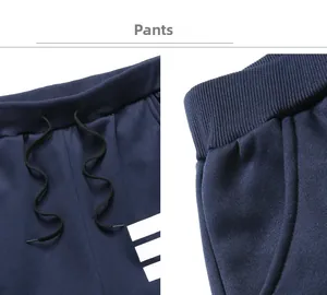 Detail of navy sports trousers featuring drawstring waistband and side stripe accents