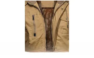 Detailed macro view of khaki worker jacket with warm fleece lining and sturdy zipper