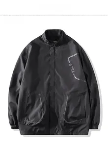 Flat lay of black men's sport jacket with YSLB print, standing collar, and zip-up pockets