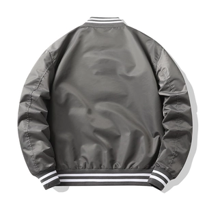 Rear view of dark grey nylon pilot jacket featuring striped ribbed cuffs and hem