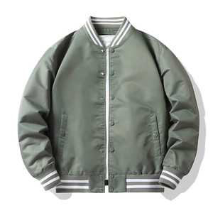 Detail of sage green flight jacket featuring white striped ribbed cuffs and snap buttons