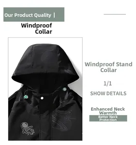Detail view of windproof hood and stand-up collar with astronaut print on black jacket
