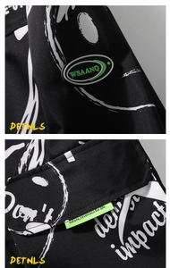 Détail de la veste avec imprimé graffiti, écusson logo et étiquette tissée vert citron