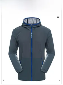 Detail view of dark grey ice silk sun protection jacket with blue zipper and text accent