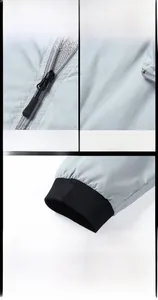 Détail de la veste pare-soleil gris clair avec fermeture éclair et tissu à carreaux