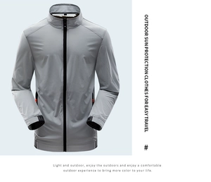 Detail view of men's sun protection jacket with orange zipper pulls and collar branding