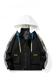 Detail of hooded jacket featuring black and white contrast with blue yellow gradient drawstrings