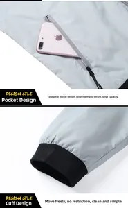 Vue détaillée de la poche zippée et des poignets côtelés de la veste de protection solaire homme