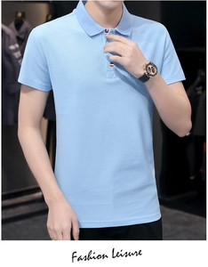 Detail of light blue short sleeve polo shirt showing collar texture and button placket