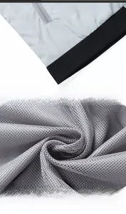 Détails d'une veste de protection solaire gris clair avec ourlet et doublure filet