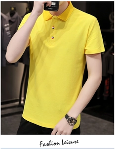 Close-up of bright yellow polo shirt with stand collar and textured cotton pique fabric