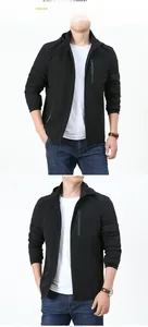 Detail view of a men's black lightweight jacket featuring a waterproof chest zipper and hood