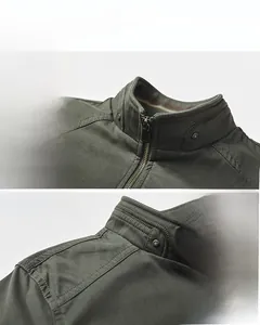 Detail view of military green casual jacket showing stand collar, zipper and shoulder seams