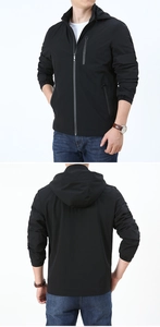Detail view of men's black hooded windbreaker jacket with chest zipper and elastic cuffs