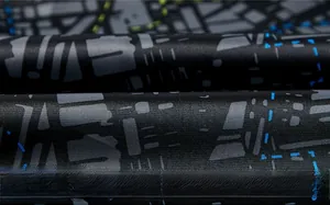 Detail shot of breathable inner lining fabric with geometric patterns for outdoor jackets