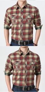 Détail d'une chemise à carreaux rouge et jaune avec deux poches poitrine et col à revers