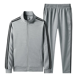Men's casual grey tracksuit set featuring zip-up jacket and pants with side stripes
