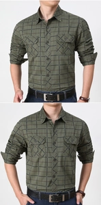 Detail of military green plaid shirt featuring dual chest pockets and durable cotton fabric