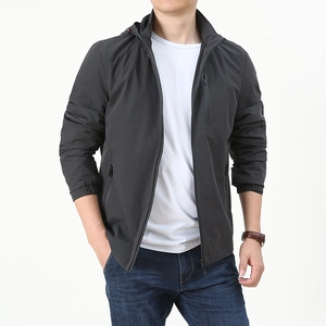 Men's dark grey hooded windbreaker with chest zip pocket for spring outdoor wear
