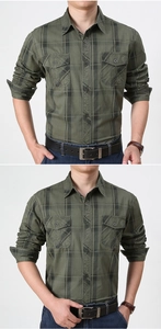 Detail of army green plaid shirt showing dual chest pockets and durable cotton canvas fabric