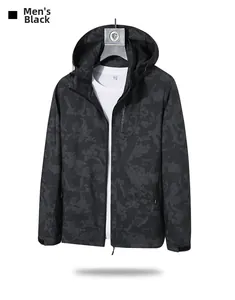 Detail of men's black honeycomb camo jacket with Explore logo zipper and hooded design