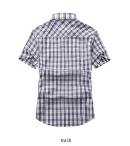 Detailed back view of men's plaid short-sleeved shirt with bias-cut yoke design