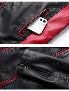 Detailansicht der Metallreißverschlüsse an rot-schwarzer Lederjacke mit Taschenkapazität