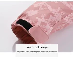 Detail of pink camouflage jacket cuff with adjustable velcro strap for windproof protection