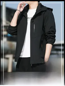 Detail of black waterproof windbreaker jacket with X-SPORT print and side zipper pocket