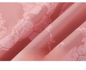Close-up of pink honeycomb camouflage fabric with windproof and waterproof texture