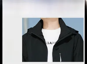 Detail view of the black stand-collar jacket with X-SPORT logo and durable zipper