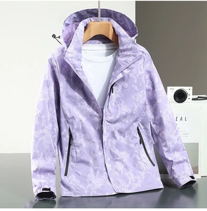Detailed view of light purple camo windbreaker with waterproof zipper and hood
