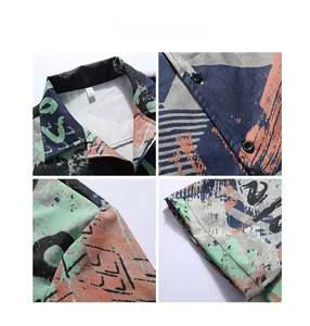 Detail view of abstract graffiti print shirt featuring collar structure and buttons