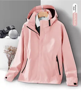 Close-up of women's butterfly pink waterproof windbreaker with adjustable cuffs and hood