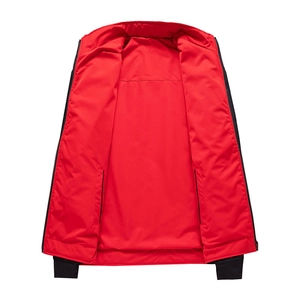 Detailed view of a red stand-collar casual vest with zipper closure and ribbed hemline