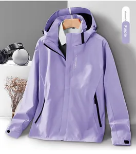 Detail of purple windproof jacket with EXPLORE print and adjustable velcro cuffs