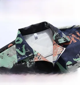 Detail of classic notched collar and abstract print on a summer ice-feel shirt