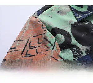 Macro detail of high-quality internal shoulder stitching on a printed men shirt
