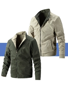 Detail of reversible stand collar jackets in olive and beige with chest embroidery
