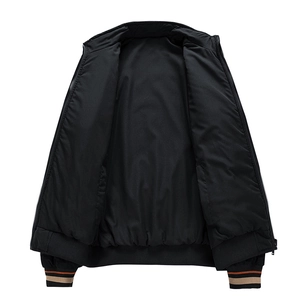 Detail view of black bomber jacket with striped ribbed cuffs and high-quality inner lining
