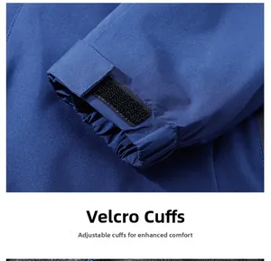 Detail of adjustable velcro cuffs on deep blue windproof outdoor jacket for men and women