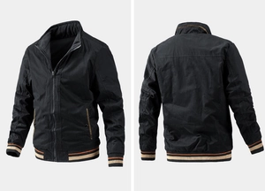 Detail of black stand collar jacket with striped ribbed cuffs and hem on invisible model