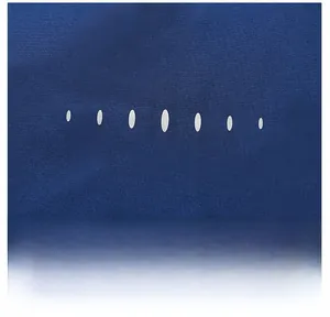Detail of waterproof dark blue polyester fabric with silver oval printed pattern
