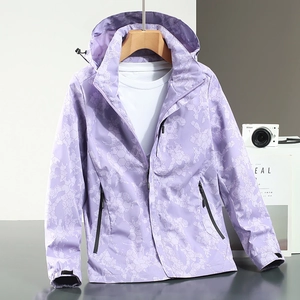 Women's purple geometric camouflage jacket with waterproof hood and zipper pockets