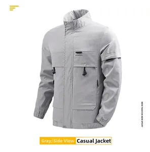Detail der grauen Freizeitjacke mit Stehkragen, Brusttaschen und STADDERED-Aufnäher