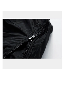 Detail of waterproof nylon fabric featuring a smooth zipper and tight stitching craft