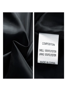 Detail view of 100% polyester jacket lining and fabric texture with inner washing label
